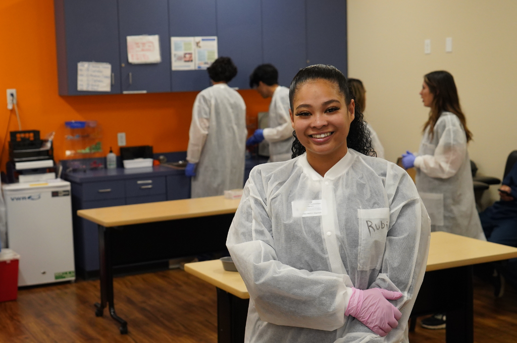 Student becoming a phlebotomist in Texas poses for picture.