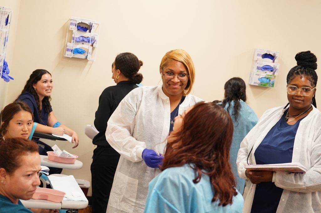 Phlebotomist training at vocational school.